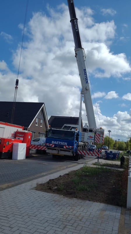 Kraan voor het takel van wat spullen die nodig zijn voor de bouw